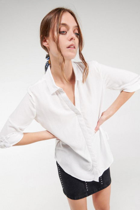 Blusa unicolor manga larga