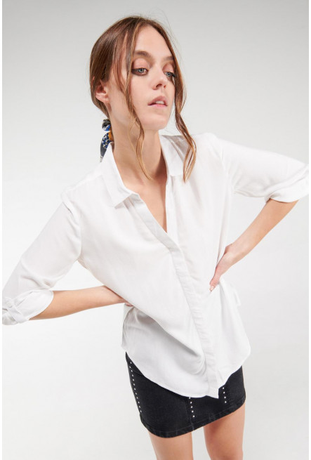 Blusa unicolor manga larga