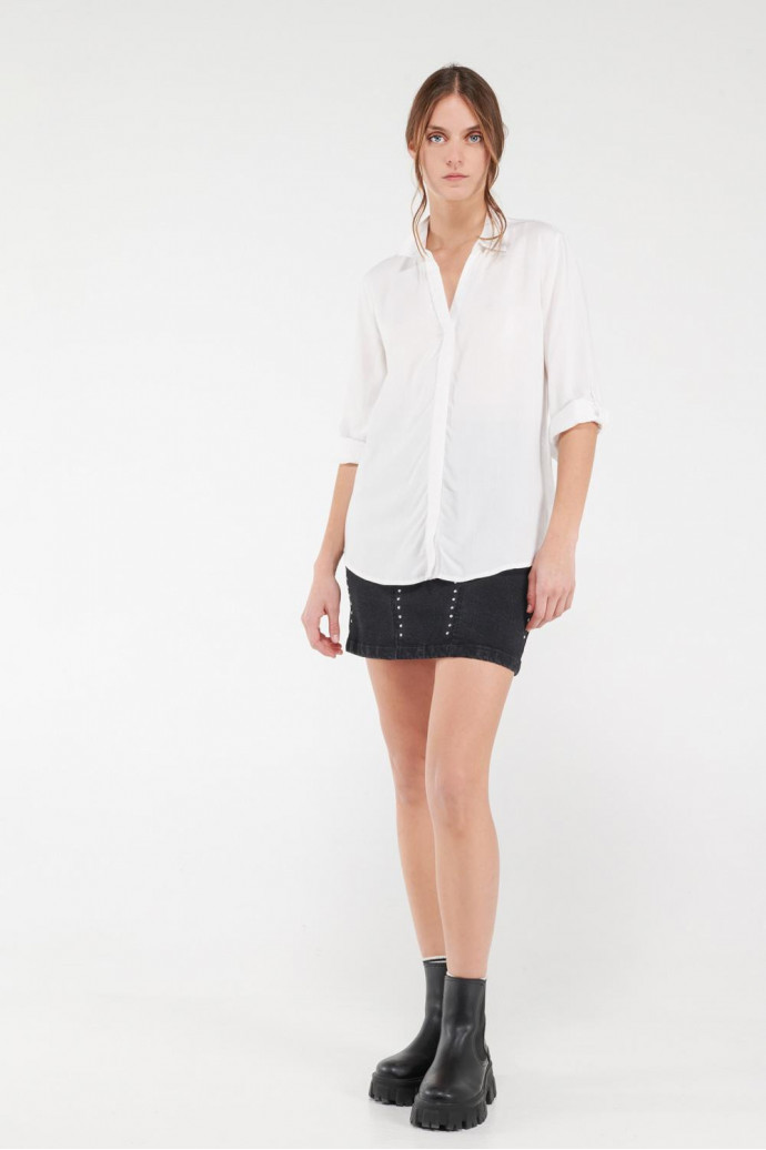 Blusa unicolor manga larga