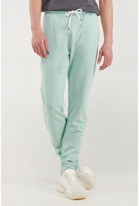 Pantalón jogger crema con pretina y puños en rib
