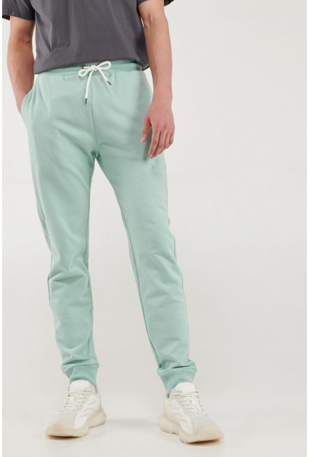 Pantalón jogger crema con pretina y puños en rib