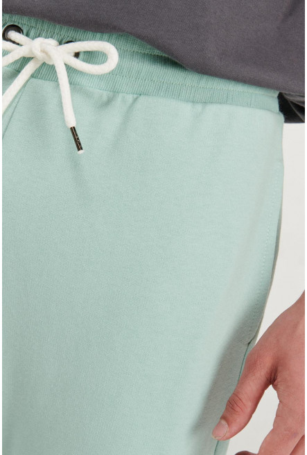 Pantalón jogger crema con pretina y puños en rib