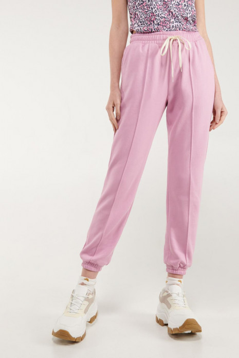 Pantalon jogger, unicolor, con bolsillos en costado.