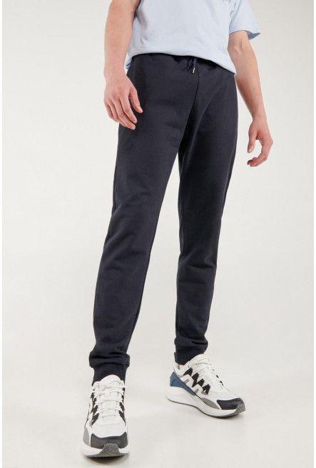 Pantalón jogger azul, con pretina y puños en rib