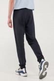 Pantalón jogger azul, con pretina y puños en rib