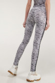 Leggins largos con sesgos laterales, con estampado de animal print.