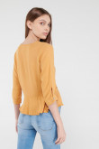 Blusa en tela fluida con bolero