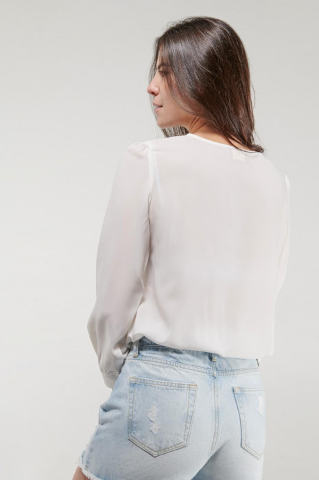 Blusa unicolor manga larga