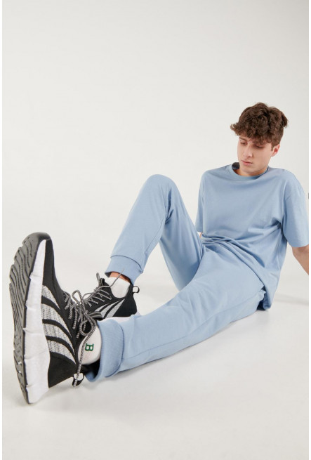 Pantalon jogger con pretina y puños en rib, estampado localizado