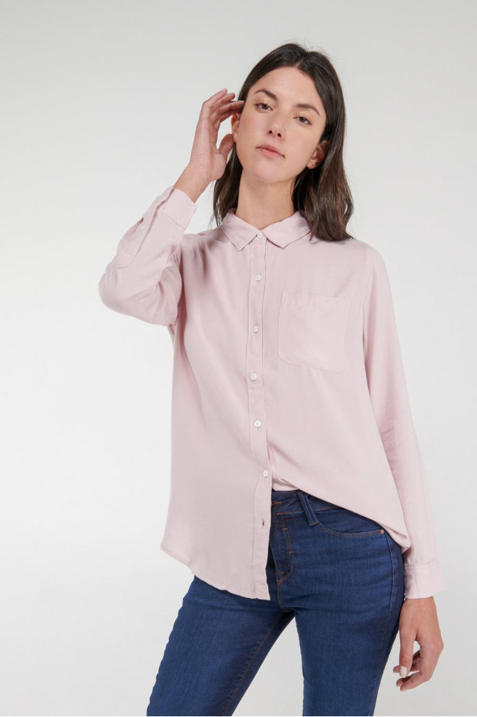 Blusa unicolor, con bolsillo