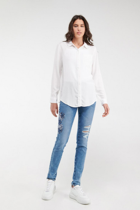 Blusa unicolor, con bolsillo
