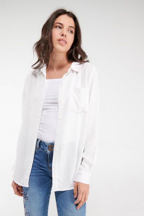 Blusa unicolor, con bolsillo