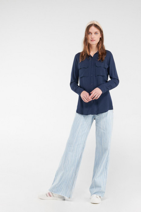 Blusa unicolor, doble bolsillo