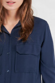 Blusa unicolor, doble bolsillo