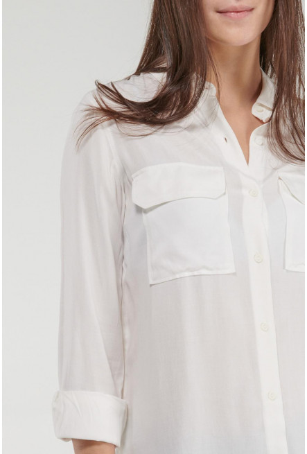 Blusa unicolor, doble bolsillo