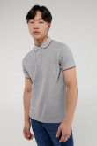 Polo unicolor, cuello y puños tejidos