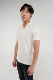 Polo unicolor, cuello y puños tejidos