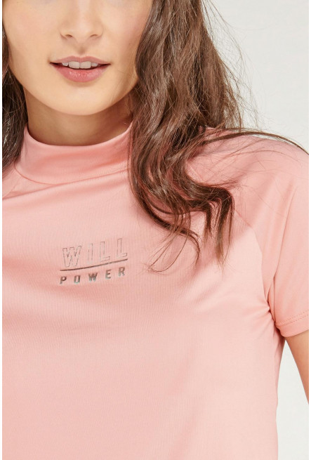 Camiseta Fit manga ranglan corta con estampado.
