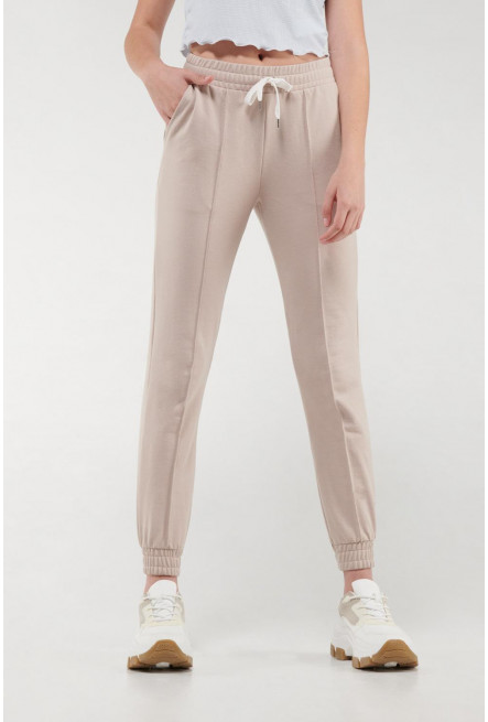 Pantalon jogger, unicolor, con bolsillos en costado