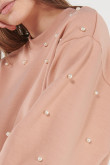 Buzo cuello redondo, con perlas en mangas y hombros.