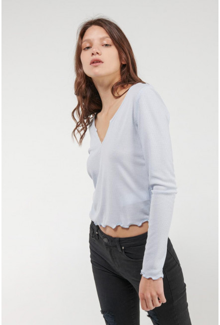 Camiseta manga larga unicolor.