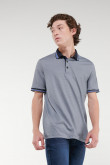 Camiseta Polo estampada, puños y cuello tejidos.