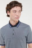 Camiseta Polo estampada, puños y cuello tejidos.