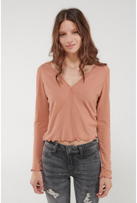 Camiseta manga larga unicolor.