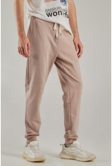 Pantalón jogger azul, con pretina y puños en rib