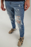 Jean Slim con rotos